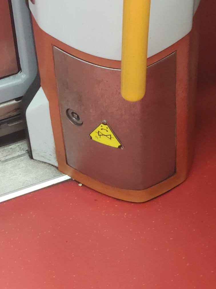 sad yellow bowtied triangle is sad